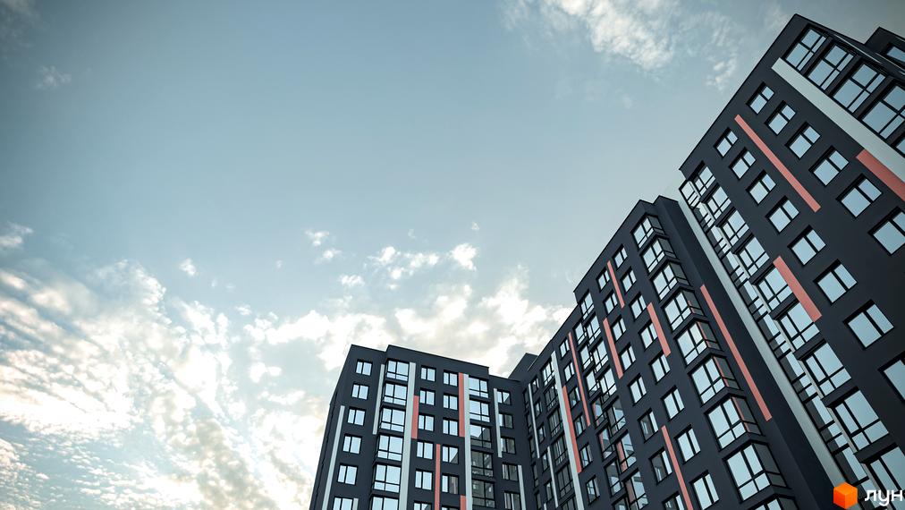 Високі будівлі Новобудови Union з темними фасадами, світлими та помаранчевими вертикальними смугами на тлі неба.