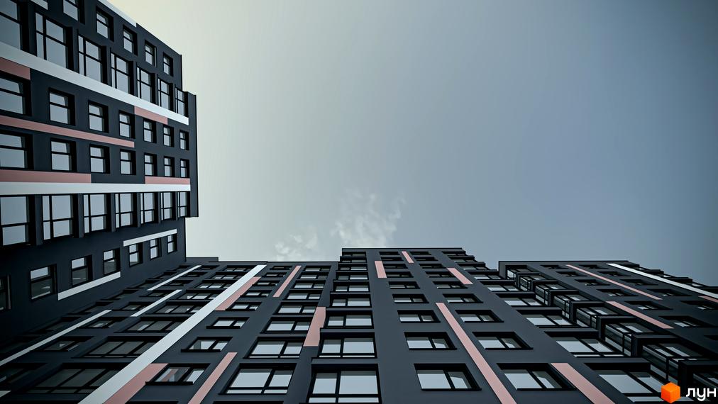 Зовнішній вигляд новобудови ЖК Union з темними фасадами та світлими смугами. Вид знизу на будівлі та небо.