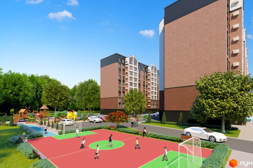 Житловий комплекс Avila Land з цегляним фасадом та зеленою прибудинковою територією, де розташовані дитячий майданчик та спортивне поле.