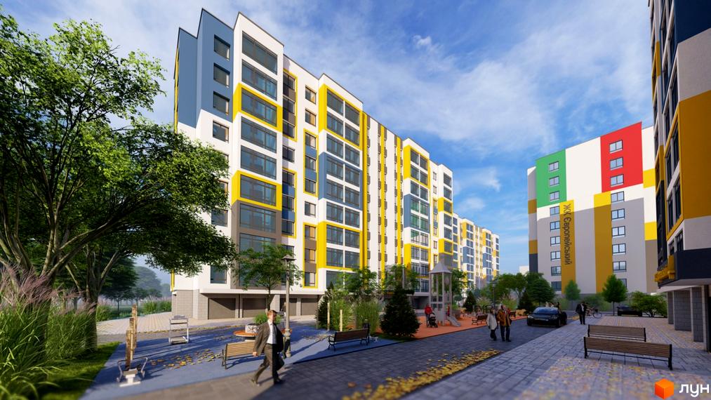 Зовнішній вигляд житлового комплексу Європейський квартал з яскравими фасадами та дитячим майданчиком на прибудинковій території.