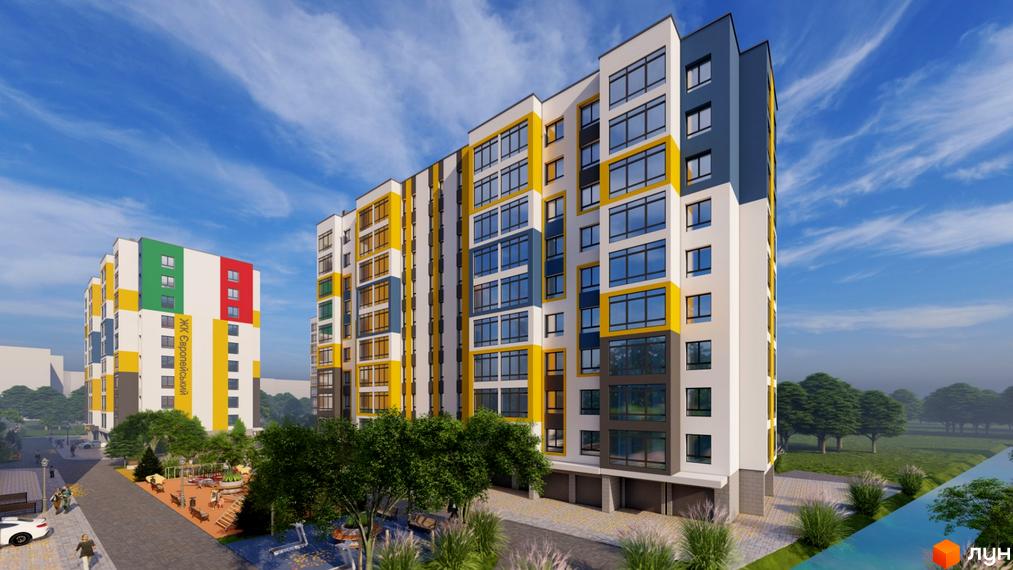 Житловий комплекс Європейський квартал: яскрава фасадна частина будинку з великими вікнами та дитячим майданчиком на прибудинковій території.