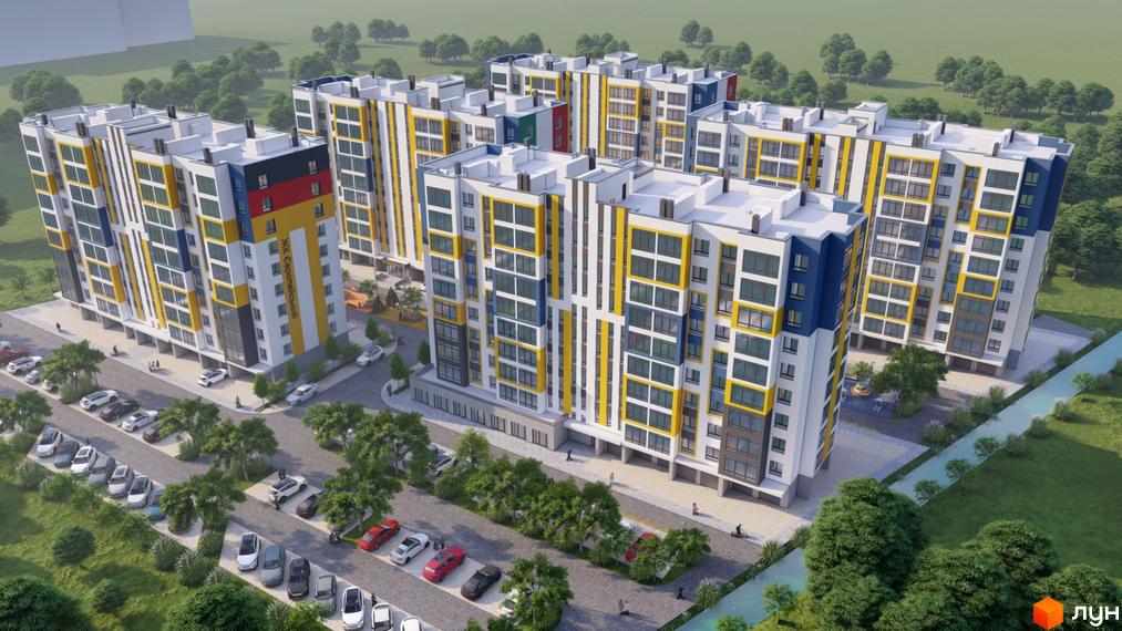 Житловий комплекс Європейський квартал з яскравим фасадом та паркінгом. Навколо комплексу зелена зона з деревами та доріжками.