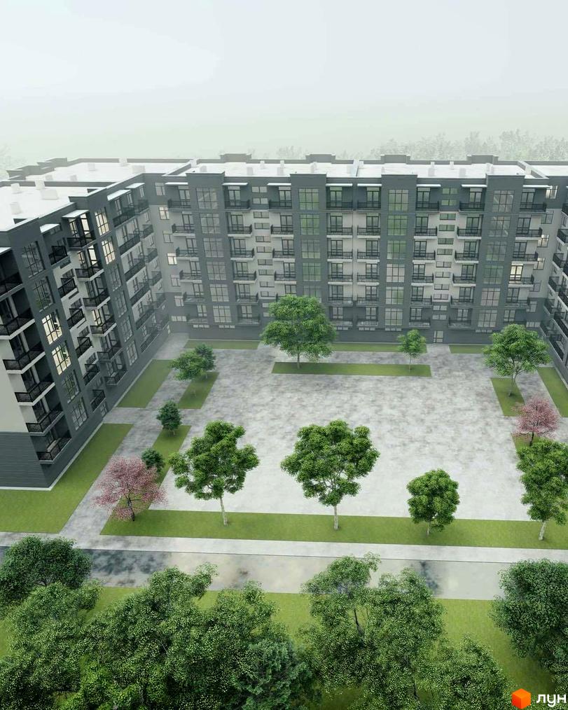 Зовнішній вигляд будинку житлового комплексу Мала Прага з балконами та великими вікнами, прибудинкова територія з деревами та вимощеним подвір'ям.