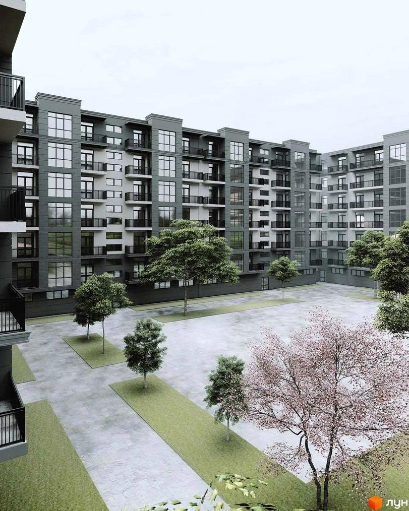 Зовнішній вигляд житлового комплексу Мала Прага з великою кількістю вікон та балконів, а також прибудинкова територія з деревами та зеленими насадженнями.