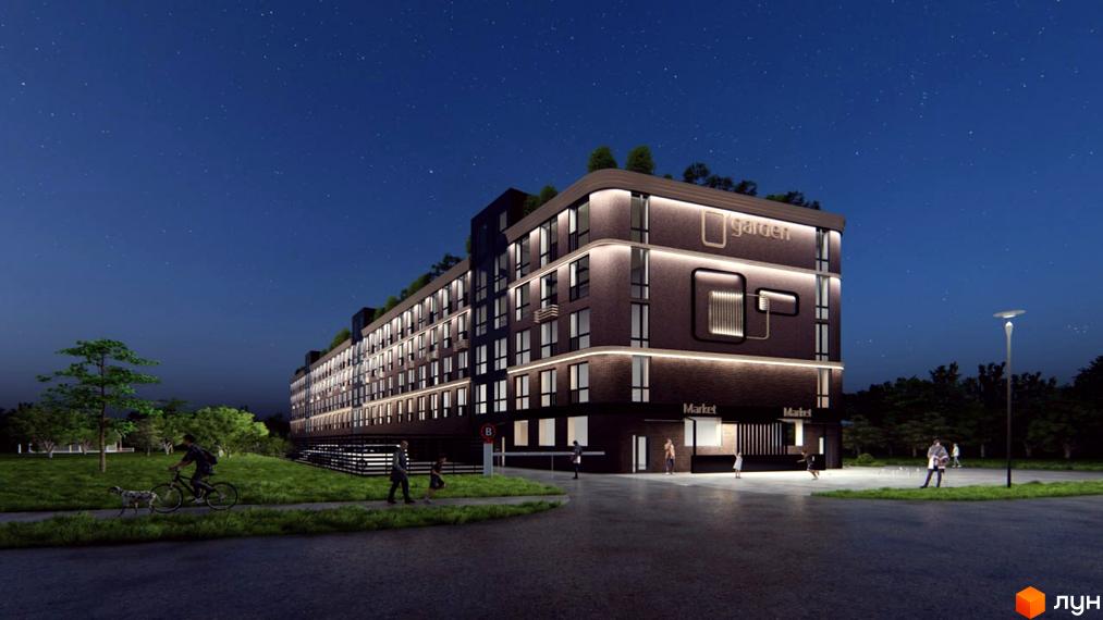 Житловий комплекс O'garden з підсвіткою вночі. На території комплексу є парковка, зелені насадження та освітлення.