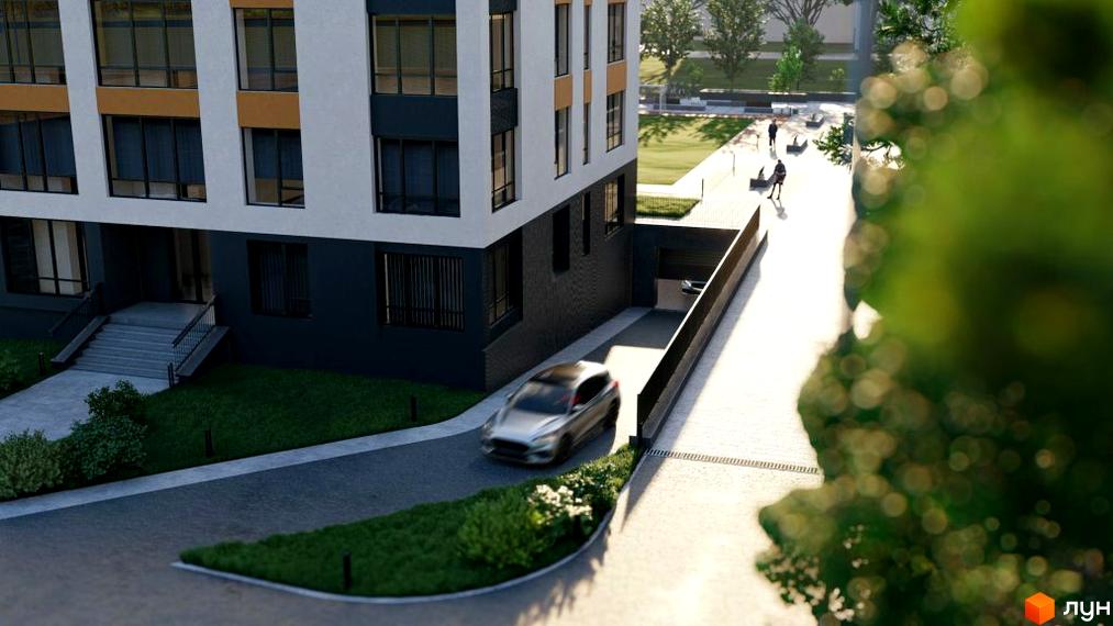 Зовнішній вигляд житлового комплексу Липки 2 з сірим фасадом та оранжевими акцентами, прибудинкова територія з дорогою та зеленими насадженнями.