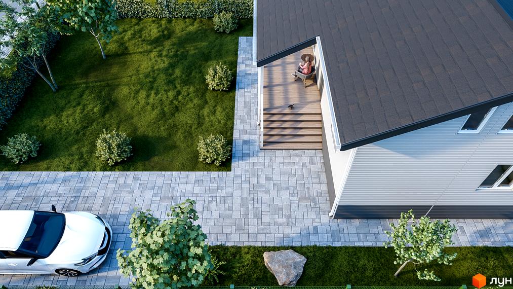 Вигляд зверху на будинок у Котеджному містечку Lagom Village з доглянутим газоном та вимощеною плиткою прибудинковою територією.