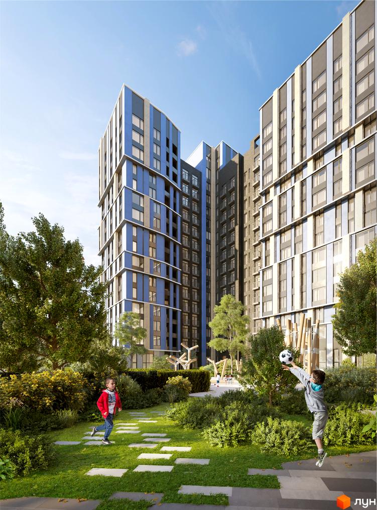 Житловий комплекс One House з багатоповерховими будинками синього та сірого кольорів. На зеленій прибудинковій території граються діти.