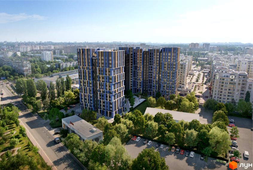 Житловий комплекс One House: багатоповерхові будинки з синьо-коричневими фасадами. Навколо комплексу багато дерев, дороги та парковки.