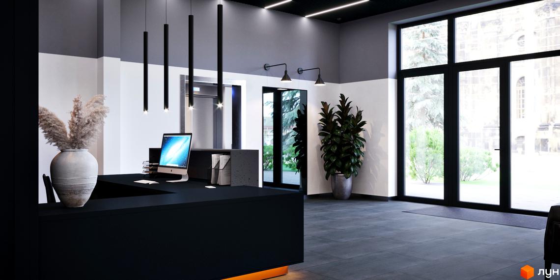 Інтер'єр лобі Новобудови One House з чорною стійкою реєстрації та великими вікнами. Через вікна видно зелену територію та архітектуру.