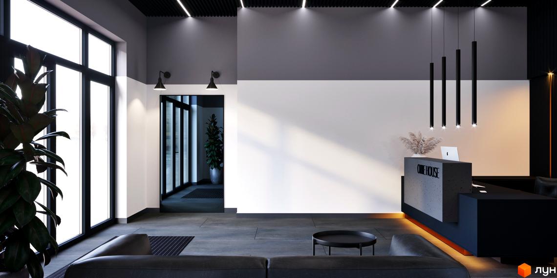 Інтер'єр вхідної групи Новобудови One House: просторий хол з великими вікнами, зоною очікування та стійкою реєстрації.