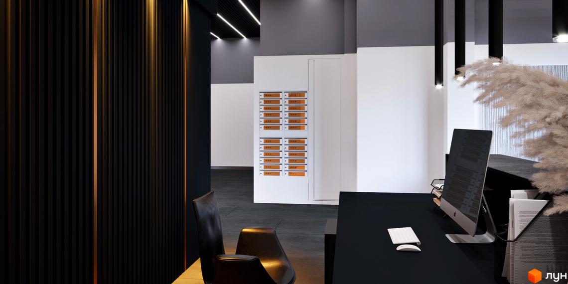 Інтер'єр лобі Житлового комплексу One House: зона рецепції з комп'ютером, поштові скриньки та декоративні стінові панелі.