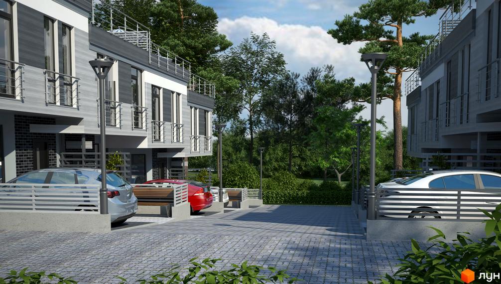 Котеджне містечко Alabama Cottage Town: фасади будинків з балконами та паркомісцями. Прибудинкова територія з бруківкою та зеленими насадженнями.