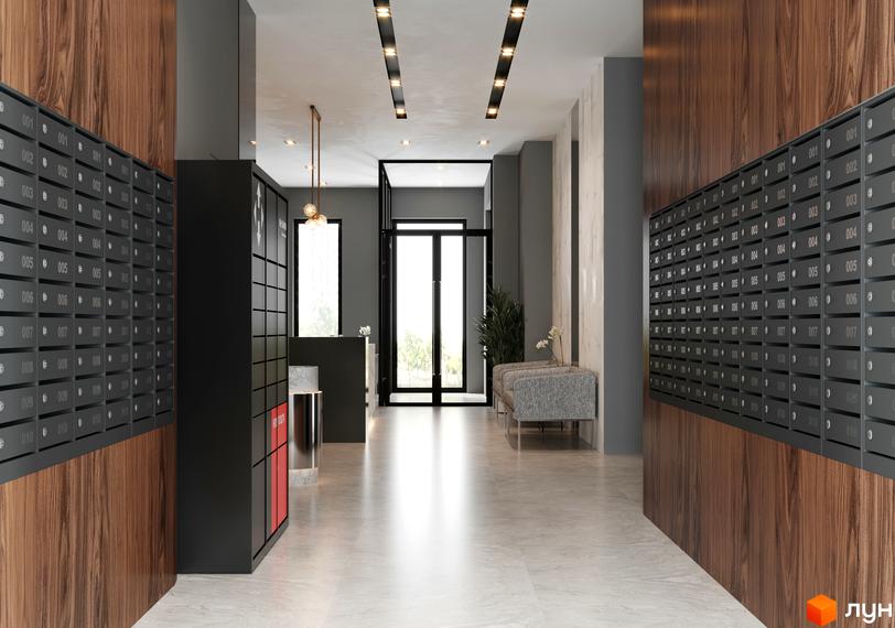 Інтер'єр холу Житлового комплексу A+Я з поштовими скриньками та зоною очікування. Вигляд вхідної групи з великими скляними дверима.