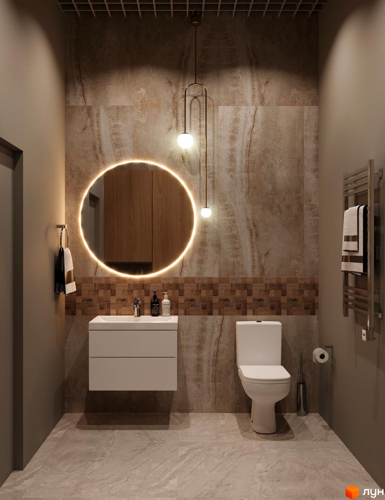Інтер'єр ванної кімнати в Житловому комплексі A+Я: кругле дзеркало з підсвічуванням, тумба з умивальником, унітаз та сушка для рушників.