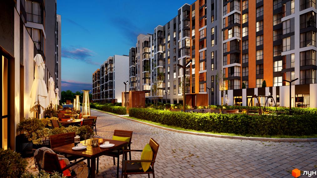 Зовнішній вигляд будівельного проєкту ЖК Рідний Дім з фасадами сірого та помаранчевого кольорів, з відпочинковою зоною на прибудинковій території.