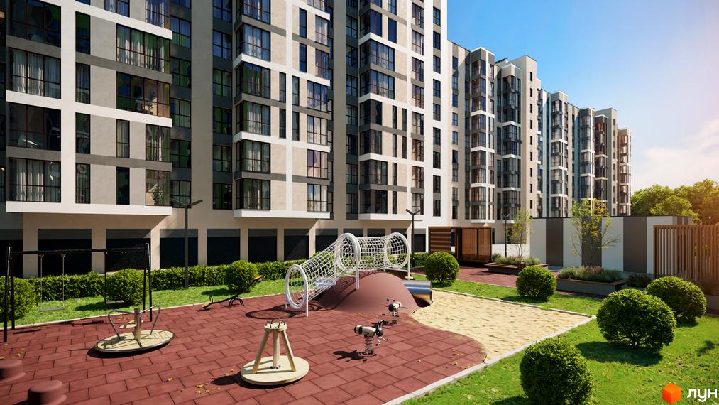 Житловий комплекс Рідний Дім з дитячим майданчиком та доглянутою прибудинковою територією з газонами та кущами.