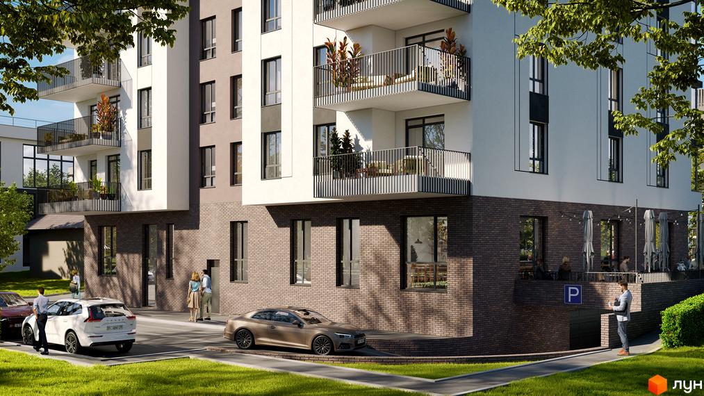 Зовнішній вигляд новобудови ЖК Грушевський з балконами та цегляним цоколем. Прибудинкова територія з автомобілями та зеленими насадженнями.