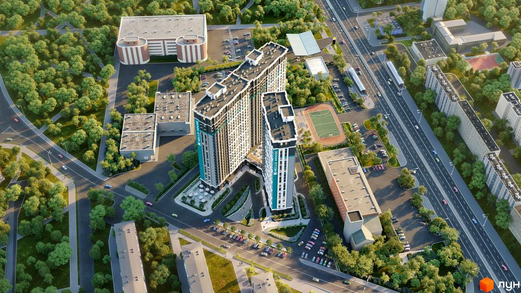 Зображення житлового комплексу Hello House з висоти пташиного польоту. Навколо будинку розташована прибудинкова територія з паркінгом.