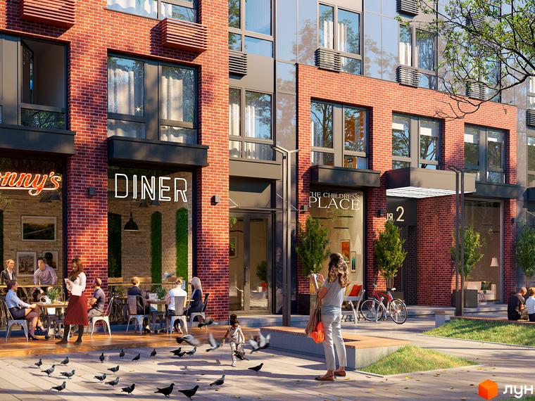 Зовнішній вигляд новобудови ЖК Новий Автограф з цегляним фасадом та великими вікнами. На прибудинковій території розташовані зони відпочинку та зелені насадження.