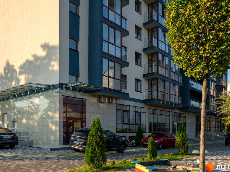 Фамільний житловий комплекс: фасади з панорамними вікнами, балконами та прибудинковою територією з деревами та автомобілями. Зовнішній вигляд новобудови.