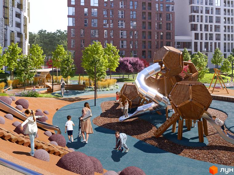 Багатоповерхові будинки Житлового комплексу LUCKY LAND з цегляними та світлими фасадами. На прибудинковій території розташований великий дитячий майданчик з гірками та деревами.