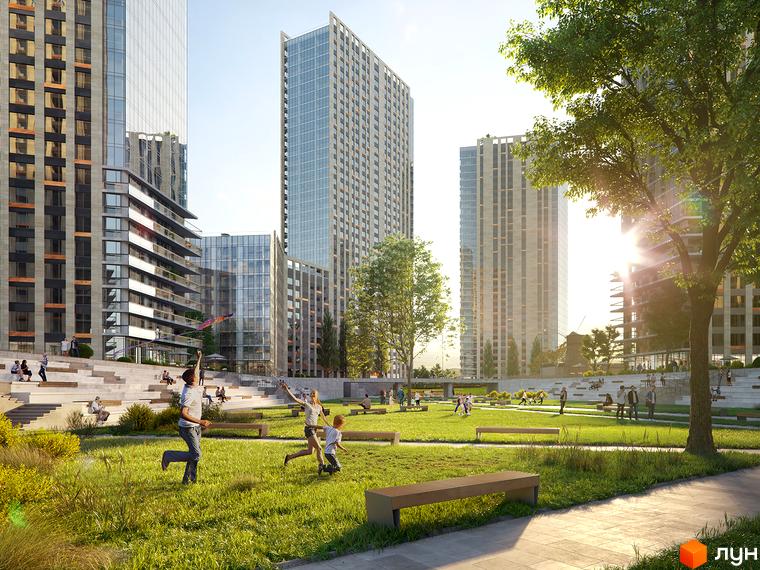 Житловий комплекс Метрополіс: високі будинки з панорамним склінням та зелена прибудинкова територія з місцями для відпочинку та дитячими майданчиками.