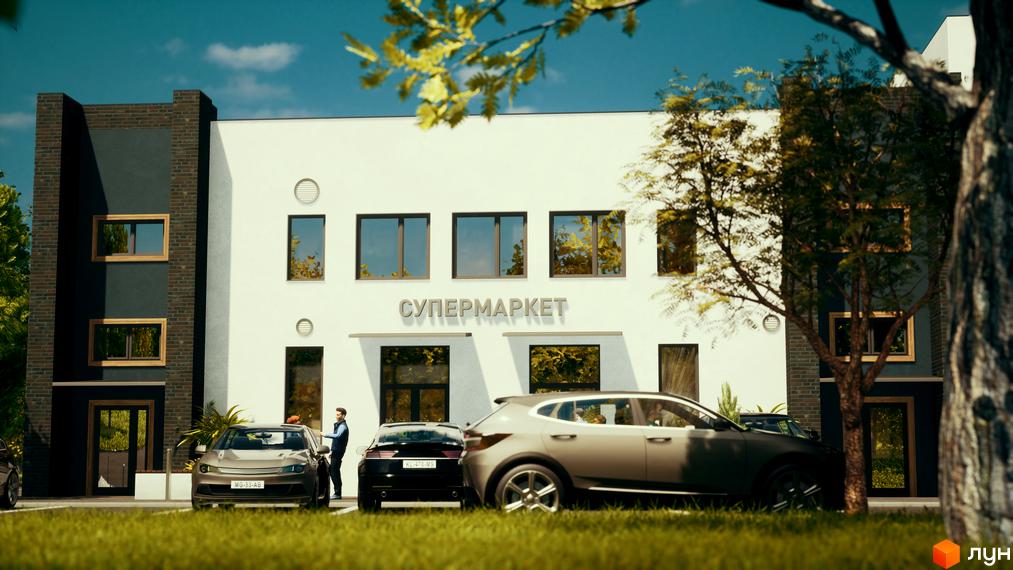 Зовнішній вигляд супермаркету з білою фасадною частиною та темною бічною секцією, перед яким припарковані автомобілі та зелена галявина.