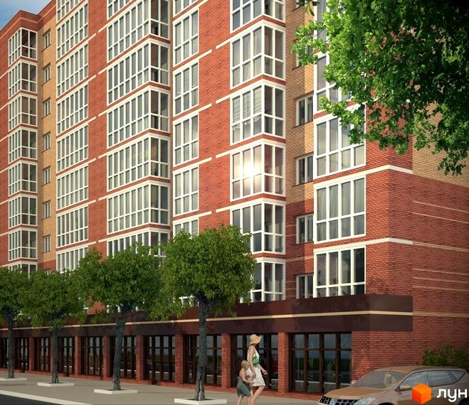 Зображення фасаду цегляного будинку в Житловому комплексі Шевченківський. На передньому плані дерева та пішохідна зона.