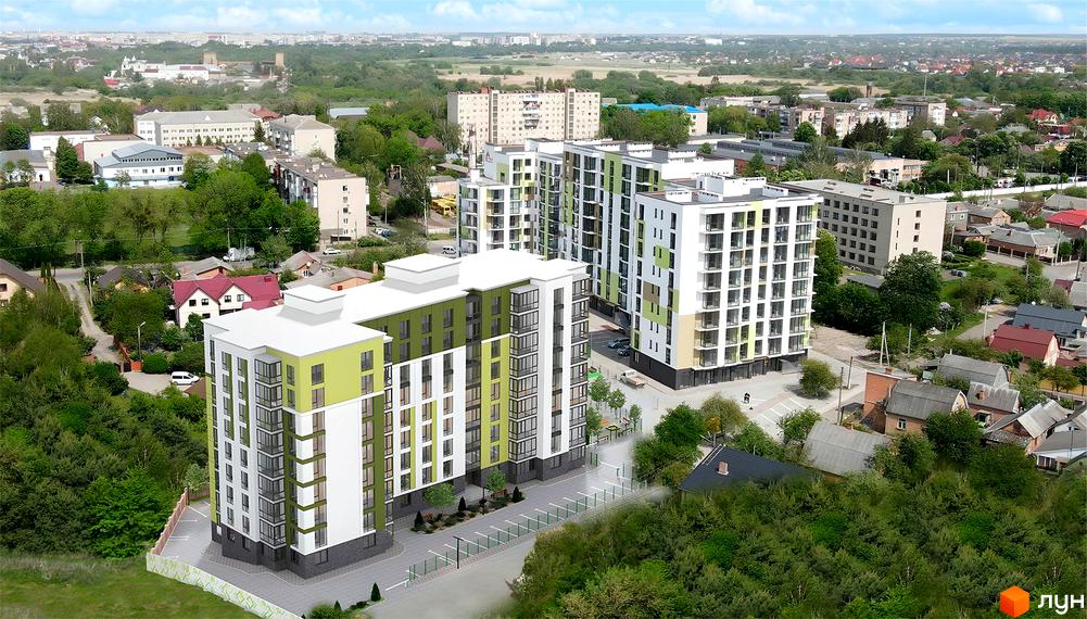 Житловий комплекс Green Estate з біло-зеленими фасадами та скляними балконами, розташований серед дерев та приватних будинків.