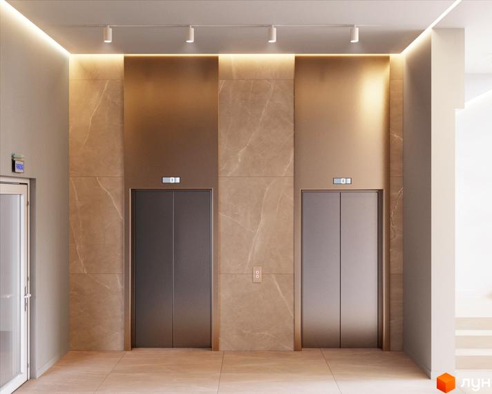 Сучасний інтер'єр ліфтового холу з мармуровим оздобленням та підсвіткою. Два ліфти з цифровими дисплеями розташовані поруч.