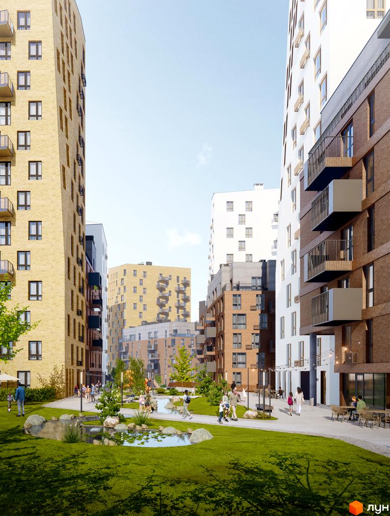 Житловий комплекс Viking Hills: сучасні фасади будівель та зелена прибудинкова територія з водоймою та місцями для відпочинку.