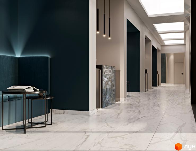 Інтер'єр холу в Будівельному проєкті Poseidon з м'якою зоною очікування та стійкою ресепшн. Вигляд на коридор з білою плиткою на підлозі.