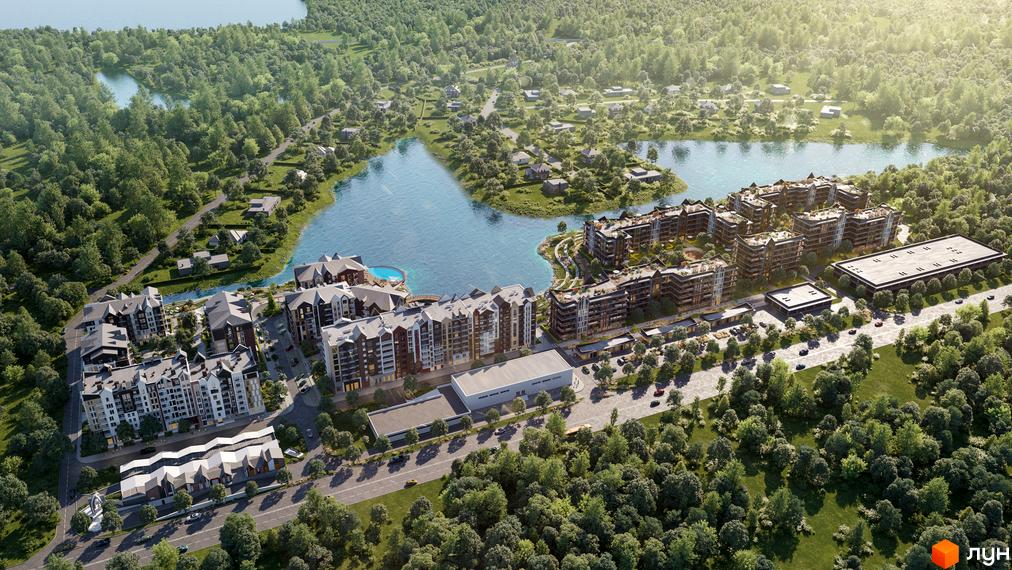 Житловий комплекс BASA city з видом на озеро та зелені насадження. Багатоквартирні будинки з архітектурою в стилі шале, поруч з будинками розташована парковка.