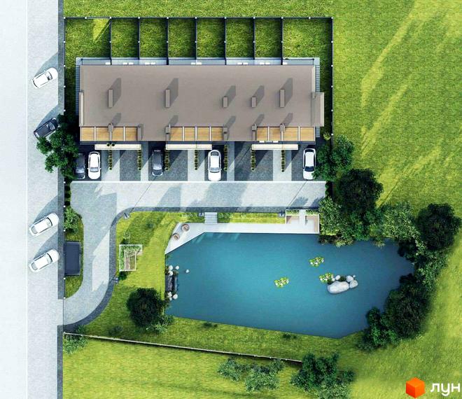 Вид зверху на Таунхауси Rusaniv Gardens з приватними парковками. Прибудинкова територія включає зелені газони та великий ставок.