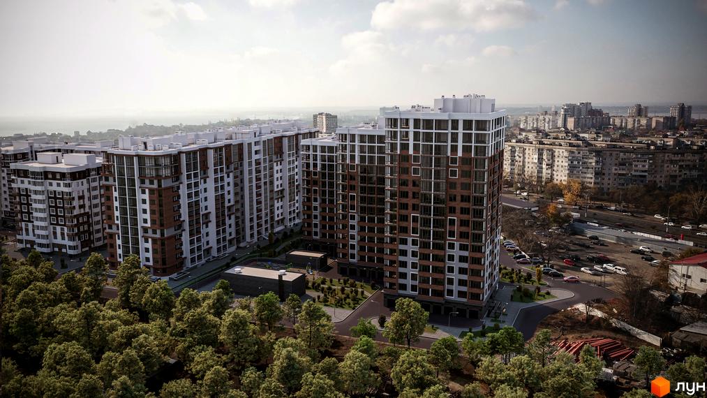 Житловий комплекс Золота Ера з висотними будинками з білими та коричневими фасадами. Навколо будівель зелені насадження та прибудинкова територія.