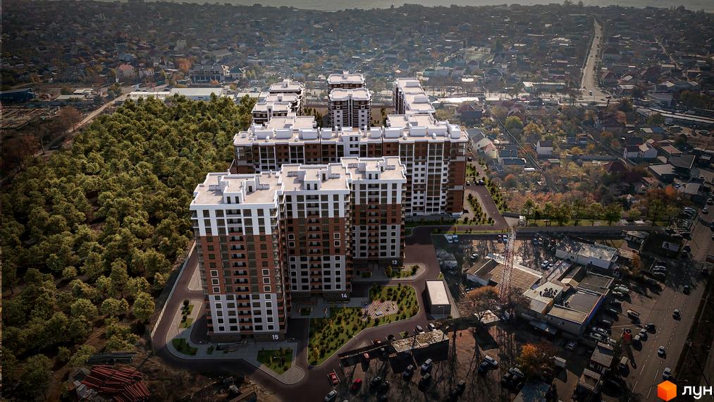 Високоповерховий будинок Житловий комплекс Золота Ера з коричневими та білими фасадами. На прибудинковій території є парковка та дитячий майданчик.