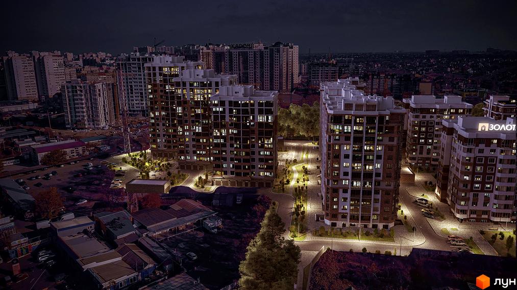 Високі будинки ЖК Золота Ера з великими вікнами, освітленням та прилеглою територією з дорогою та паркуванням. На даху одного з будинків є напис.