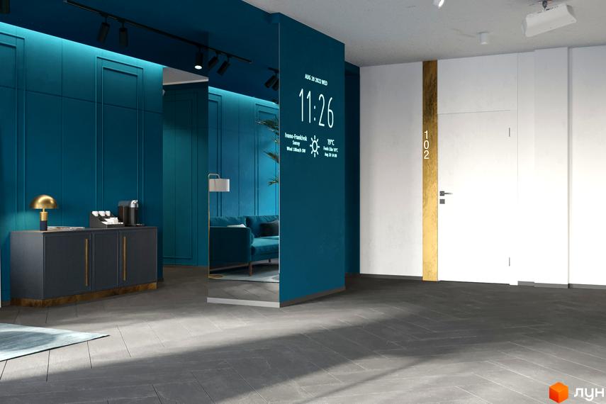Інтер'єр лобі житлового комплексу HydroPark DeLuxe з темно-бірюзовими стінами, дзеркалом та інтерактивним дисплеєм. На підлозі темно-сіра плитка.