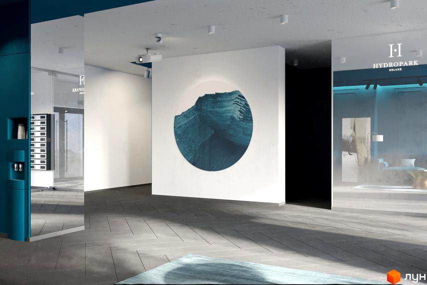 Вхідна група житлового комплексу HydroPark DeLuxe з просторим лобі, великим круглим панно та відображенням зони відпочинку.