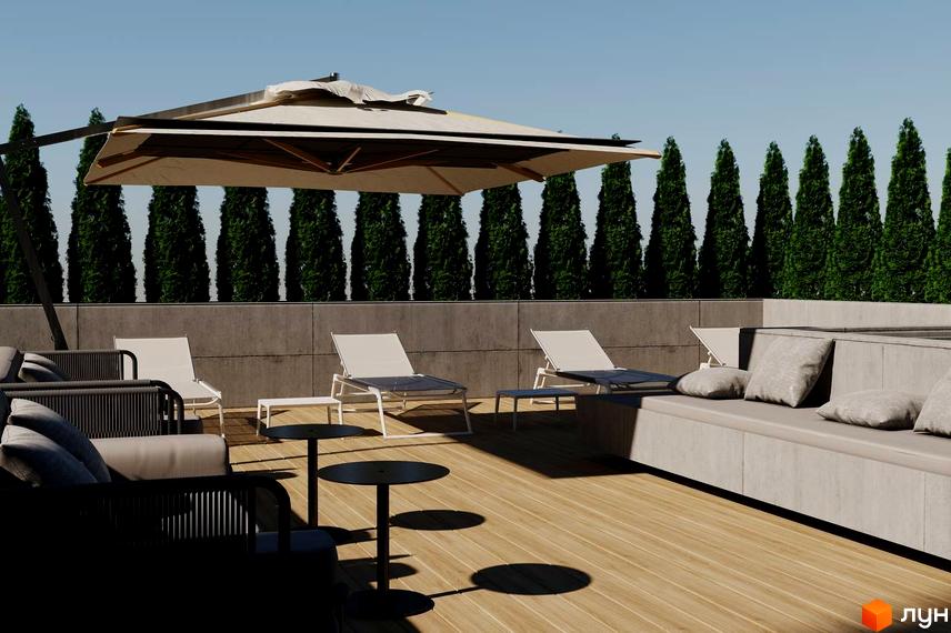 Простір для відпочинку на терасі Житлового комплексу Prestige Palace з садовими меблями та рядами дерев.