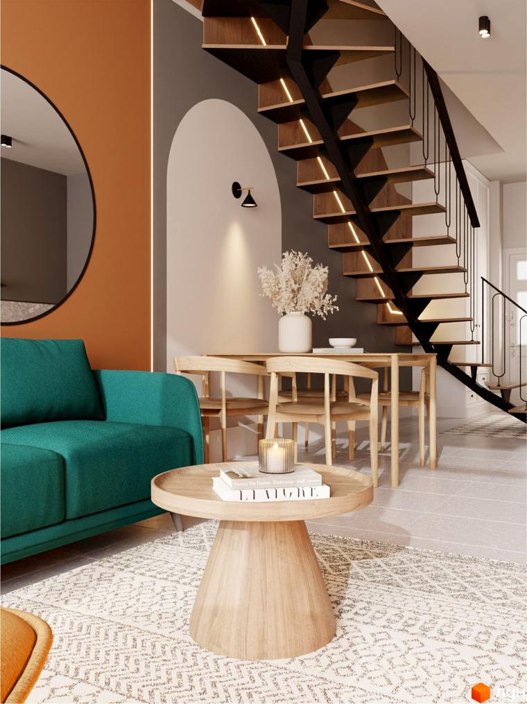 Інтер'єр вітальні з бірюзовим диваном, дерев'яними меблями та сходами з підсвіткою. AMA FAMILY RESORT – новобудова для вашого комфорту.
