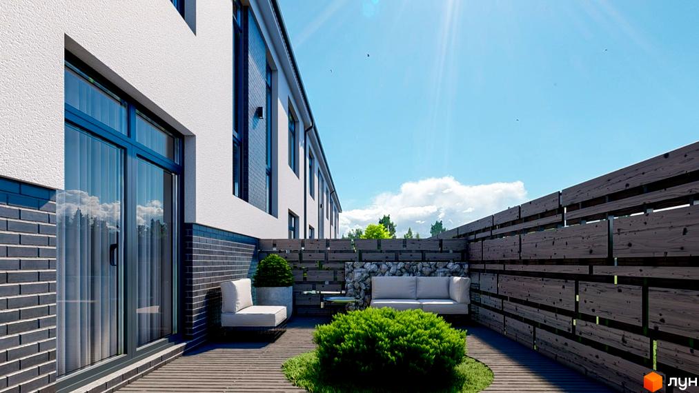 Зовнішній вигляд таунхаусу в ЖК Kulbaba Bilogorodka з терасою та зоною відпочинку. На терасі розташовані дивани, рослини та дерев'яний паркан.