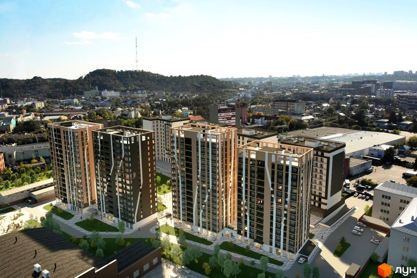 Зовнішній вигляд житлового комплексу Бетховен з висоти пташиного польоту. Комплекс складається з кількох багатоповерхових будинків з коричневим та бежевим фасадом, прибудинкова територія облаштована зеленими насадженнями та зонами відпочинку.