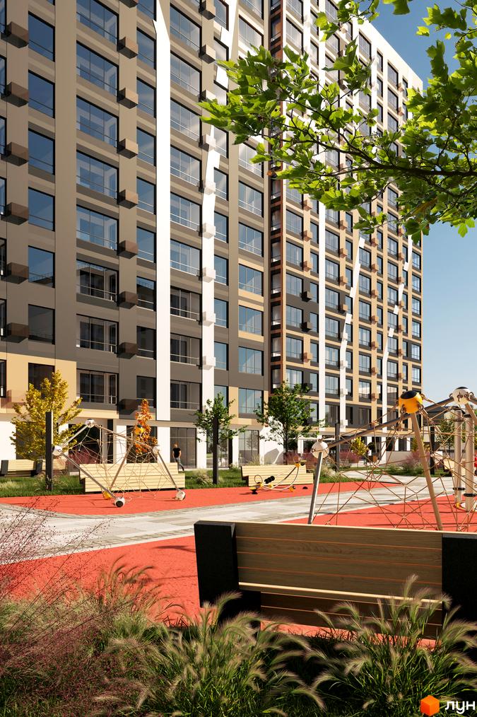 Житловий комплекс Бетховен з фасадами сірих та бежевих відтінків, вікнами з темними рамами, дитячим майданчиком та зонами відпочинку.