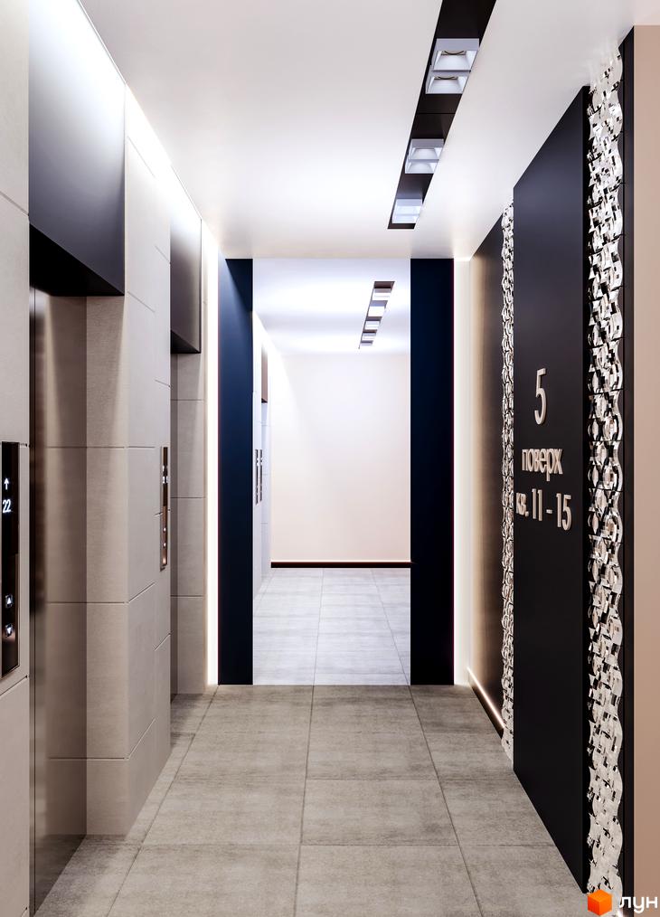 Сучасний дизайн холу житлового комплексу Maxima Residence з елементами декору та освітлення.