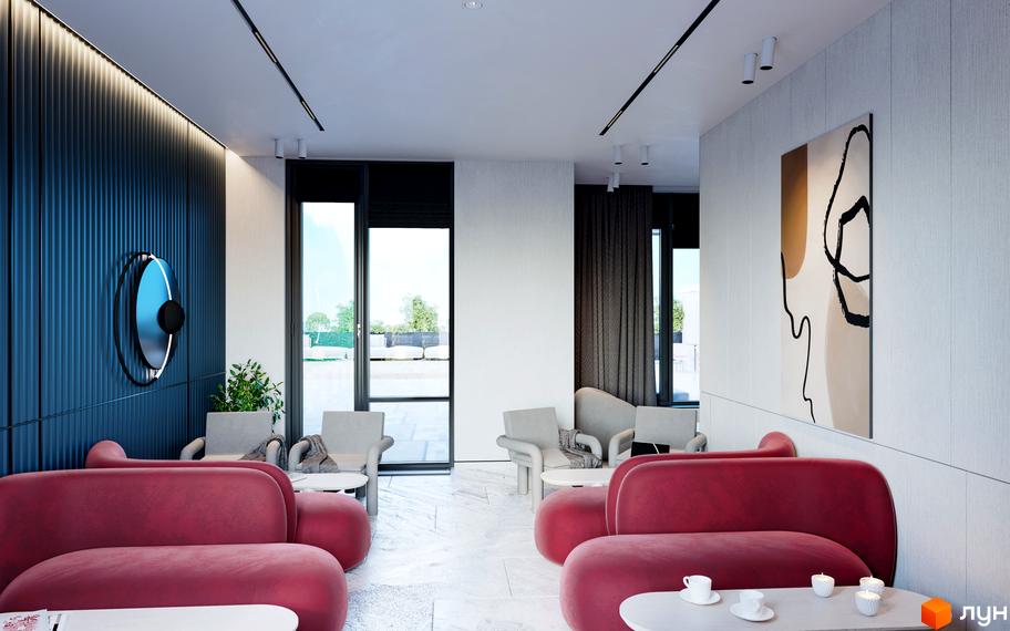 Інтер'єр зони відпочинку в ЖК Maxima Residence з червоними диванами та кріслами. Сучасний дизайн та комфортні меблі для вашого відпочинку.