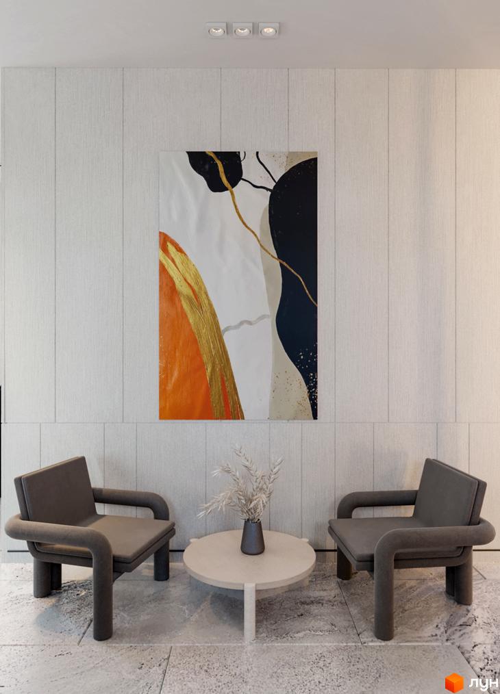Інтер'єр вітальні ЖК Maxima Residence з двома кріслами та журнальним столиком. Сучасний дизайн та арт-об'єкт на стіні.