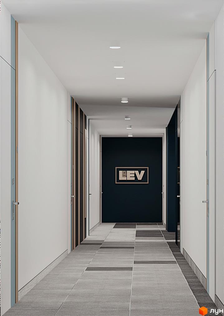 Інтер'єр коридору новобудови ЖК FEEL HOUSE з дверима та логотипом на стіні.