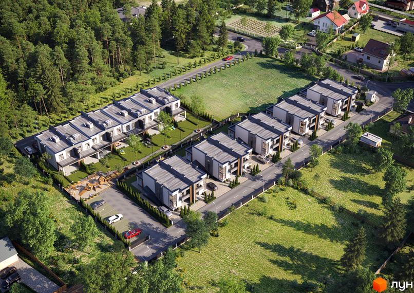 Аерознімок Котеджного містечка Dream House: ряди будинків з сіро-білими фасадами, плоскими дахами, прибудинковими територіями та лісопарком.